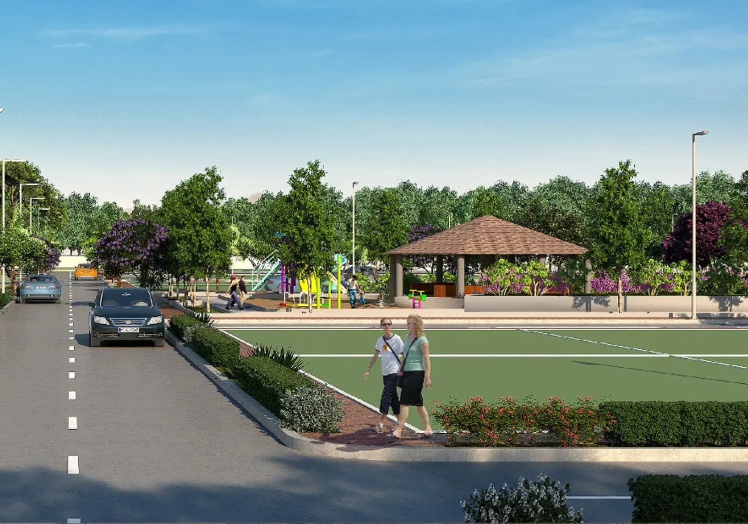 Open lawn with a gazebo and children's play area along an internal road